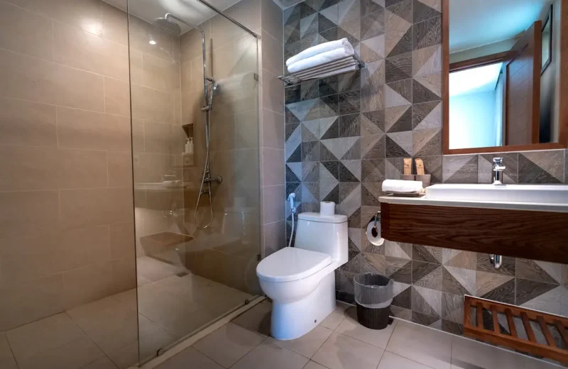 Modern bathroom renovation with stylish fixtures, tiles, and premium finishes