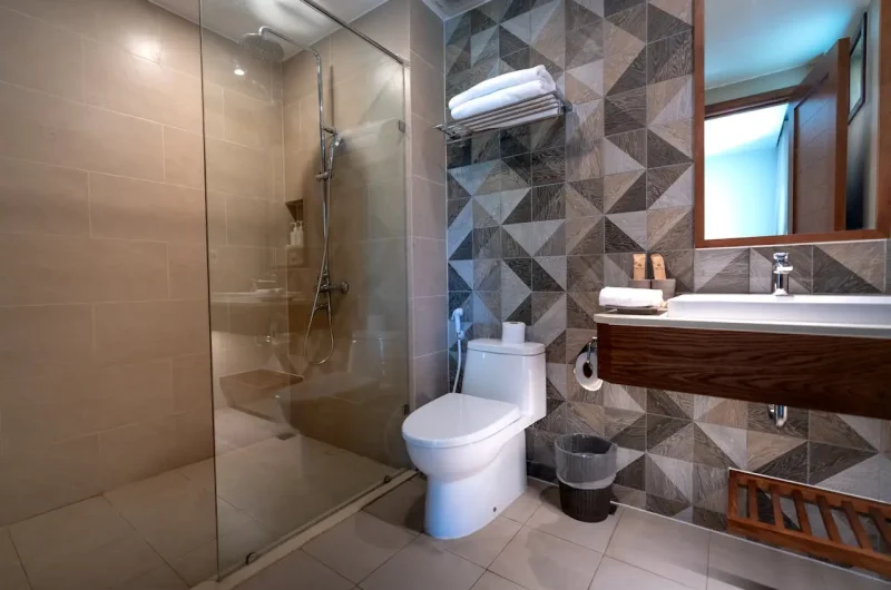 Modern bathroom renovation with stylish fixtures, tiles, and premium finishes