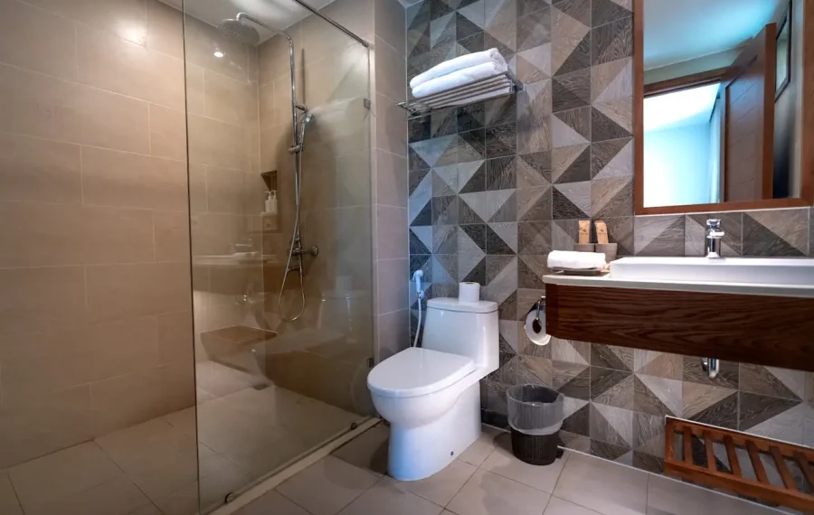 Modern bathroom renovation with stylish fixtures, tiles, and premium finishes