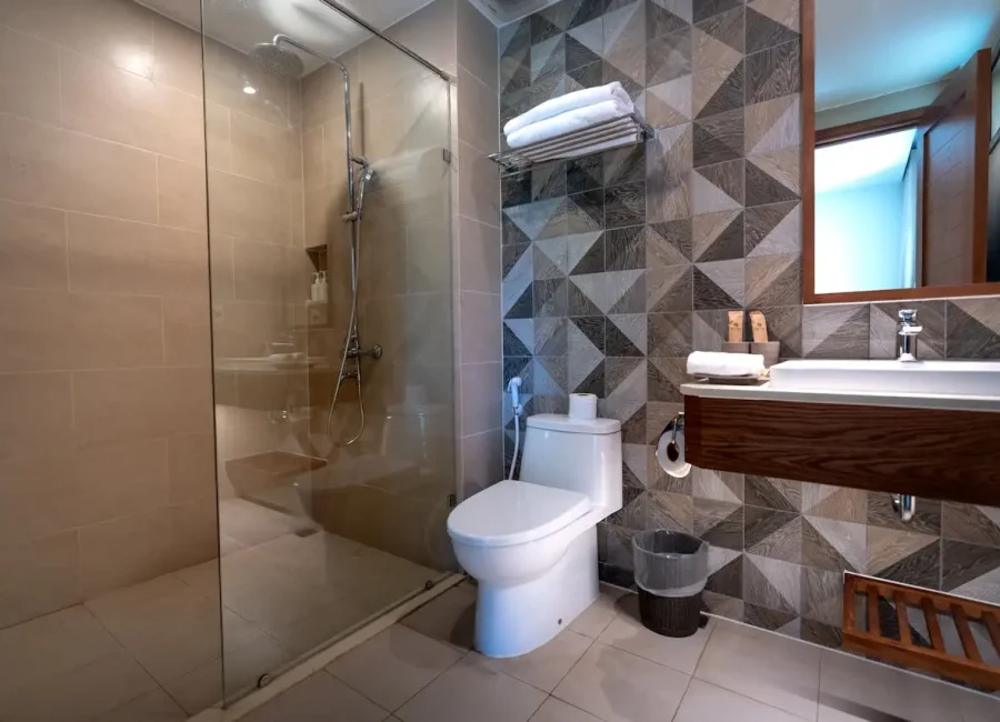 Modern bathroom renovation with stylish fixtures, tiles, and premium finishes