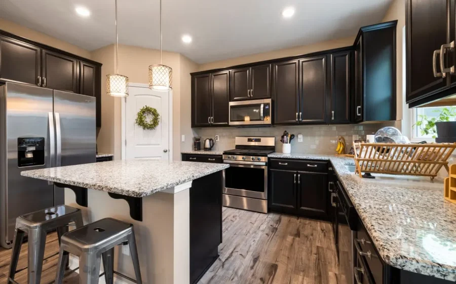 Modern kitchen renovation with custom cabinetry and premium finishes