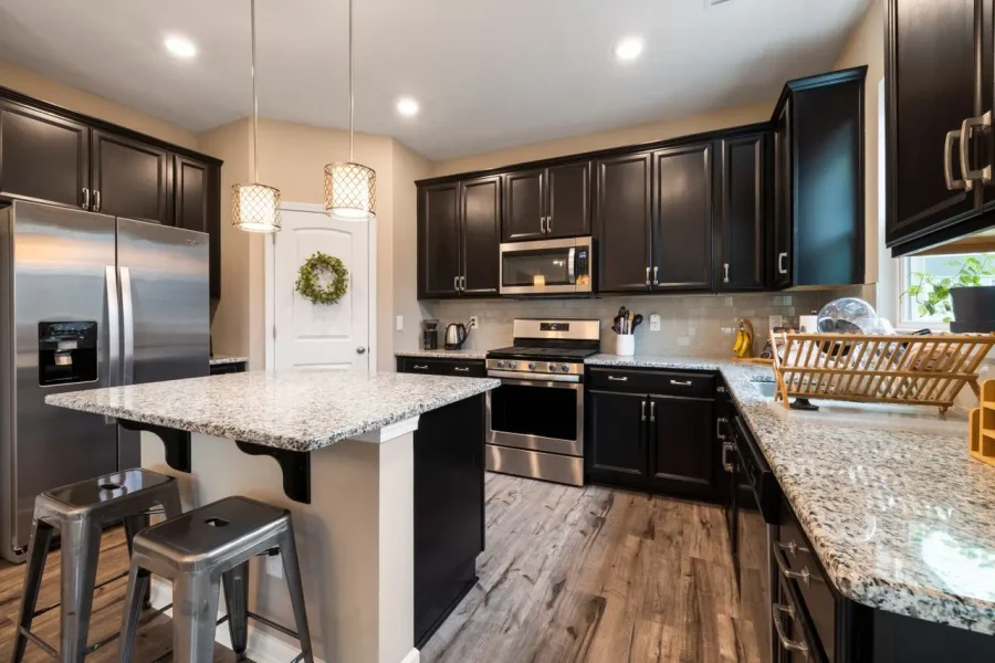 Modern kitchen renovation with custom cabinetry and premium finishes